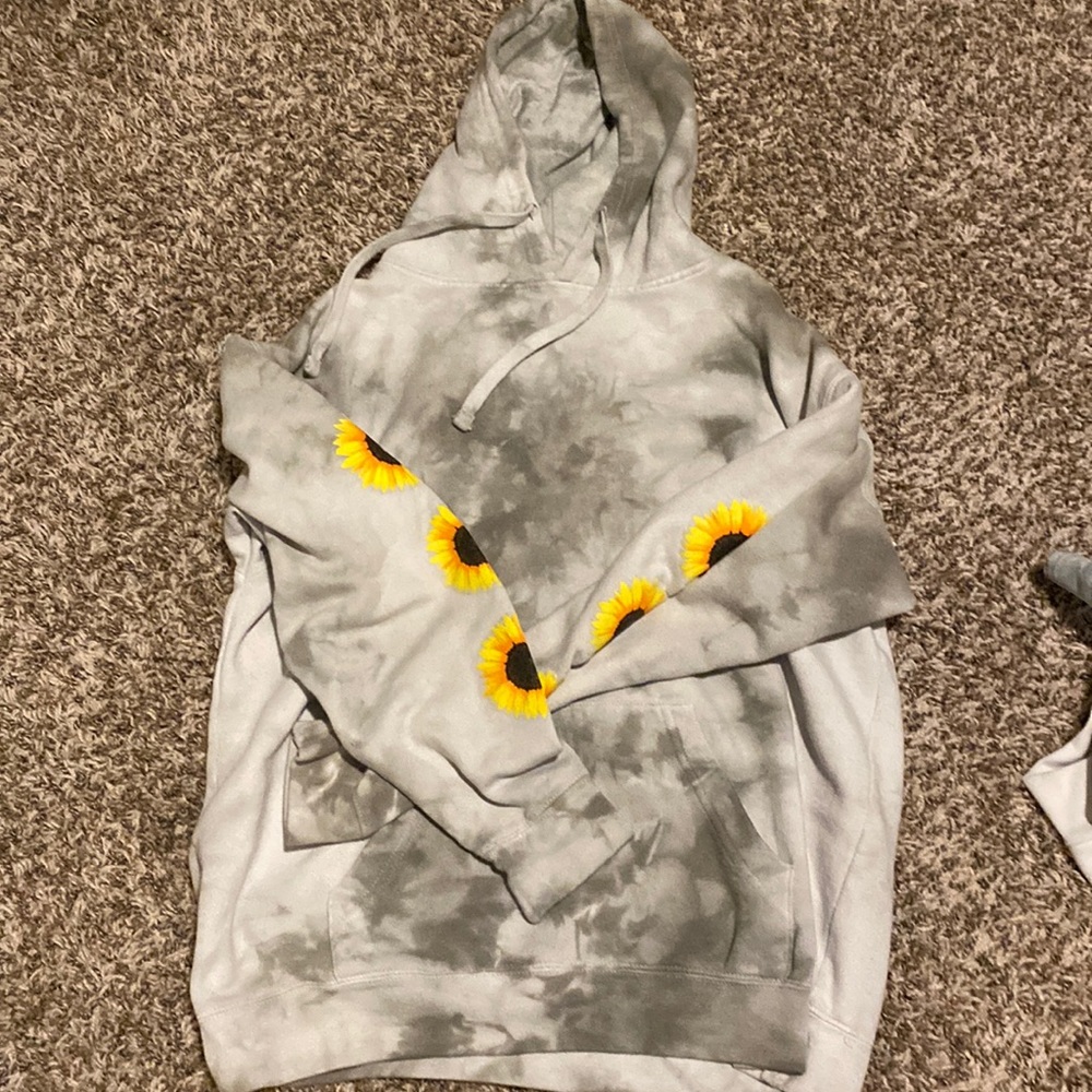 Tie dye, gray hoodie with sunflowers on the sleeves